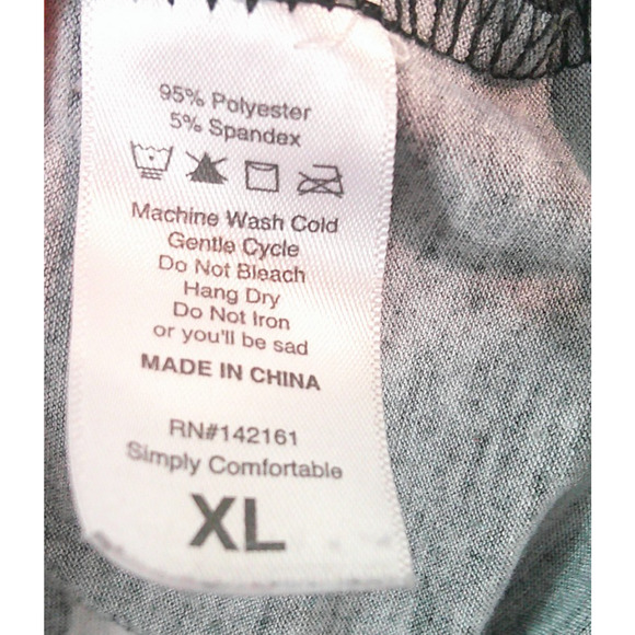 LuLaRoe V-Neck Black Short Sleeve Shirt with white skulls. Women's XL - Picture 6 of 7